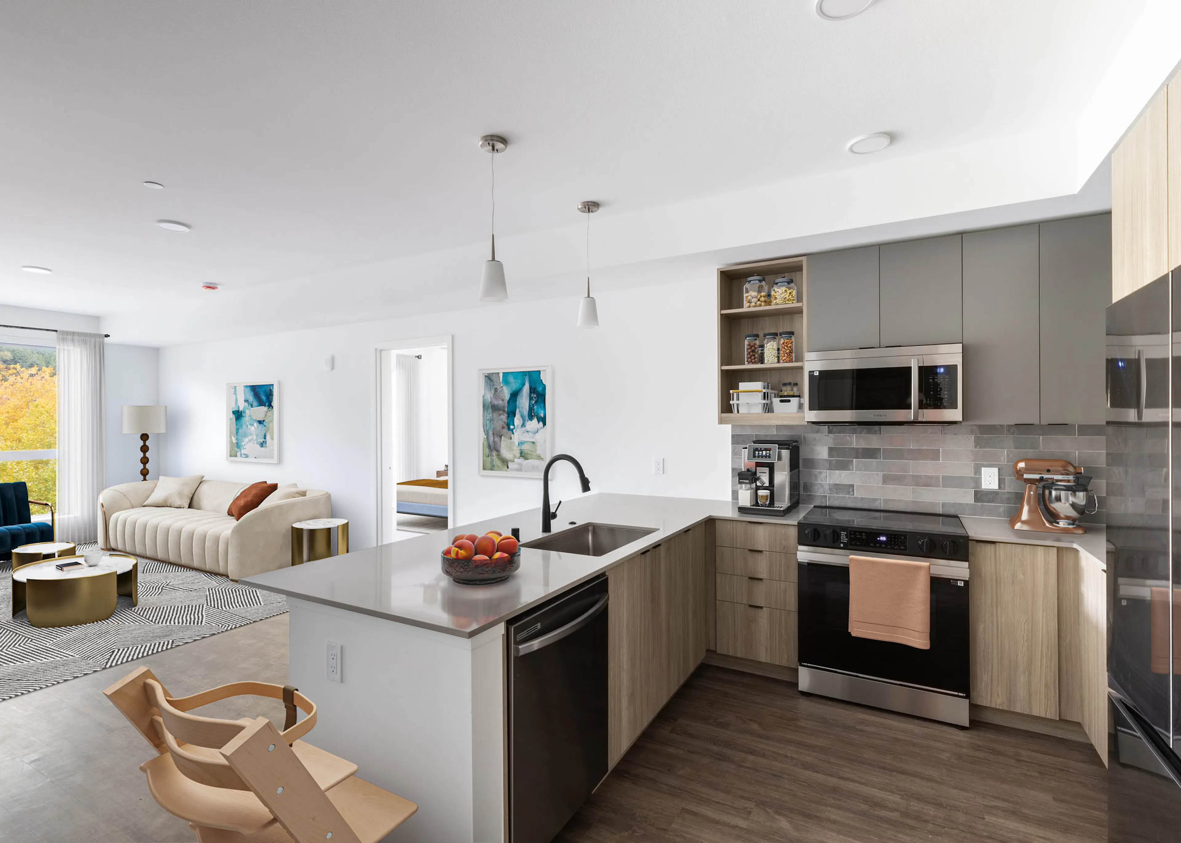 Closet area with white walls, with in-unit washer and dryer appliances, next to large storage space with space to hang clothes.