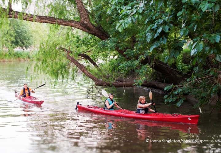 kayakers on the water at Buffalo Bayou Park