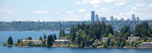 Take in the views of Lake Washington from AMLI Bellevue Park new rooftop clubroom on a beautiful sunny day with Seattle in the background