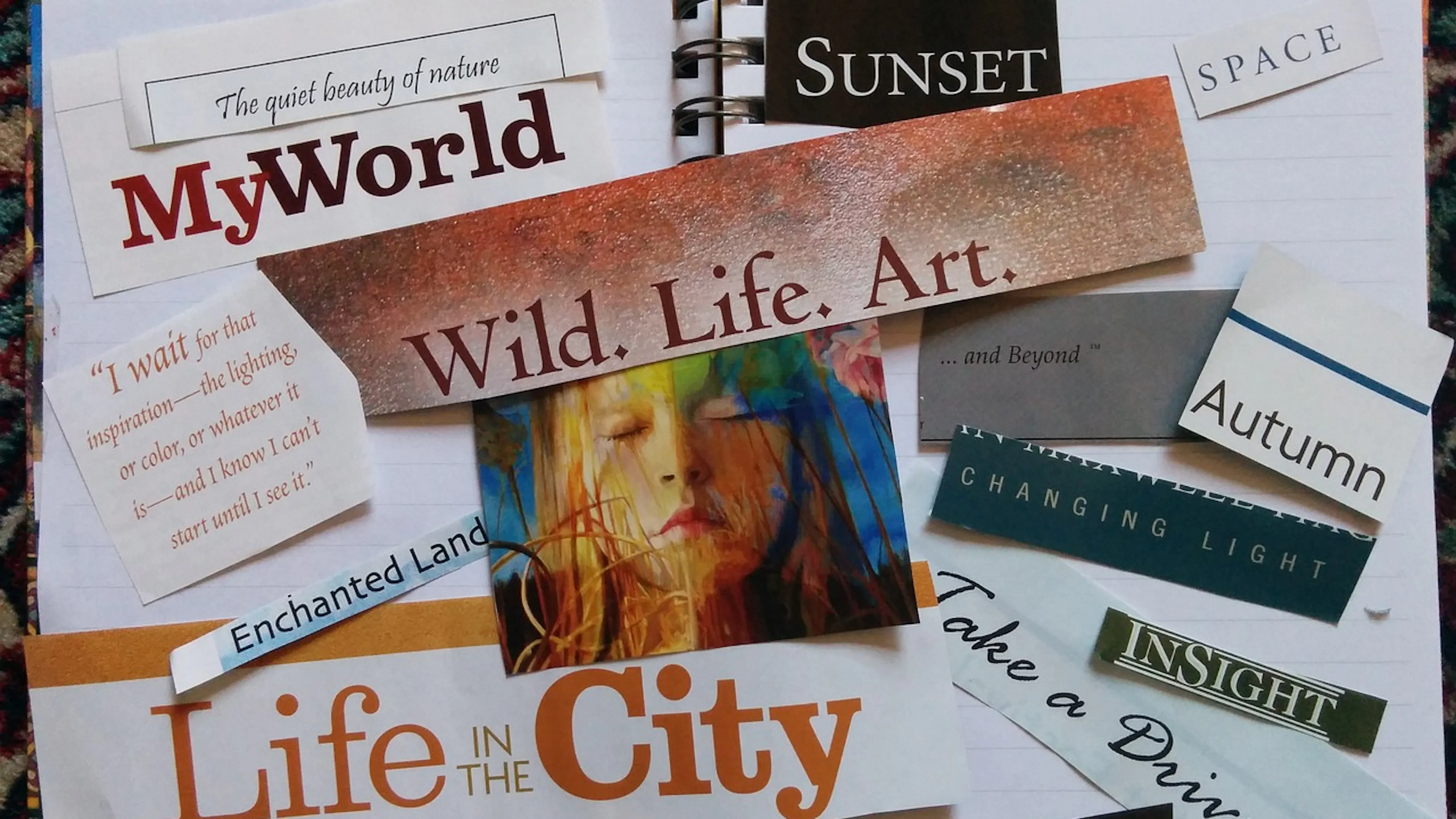 open notebook with cut out images of words from magazines and photo of woman in the center