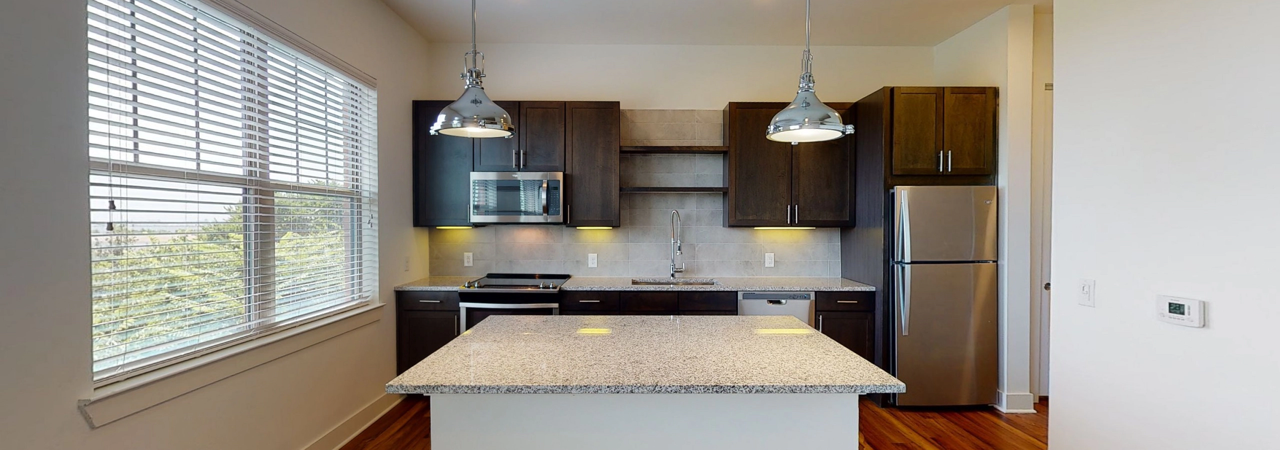 AMLI Grapevine kitchen island and cabinets with lighting