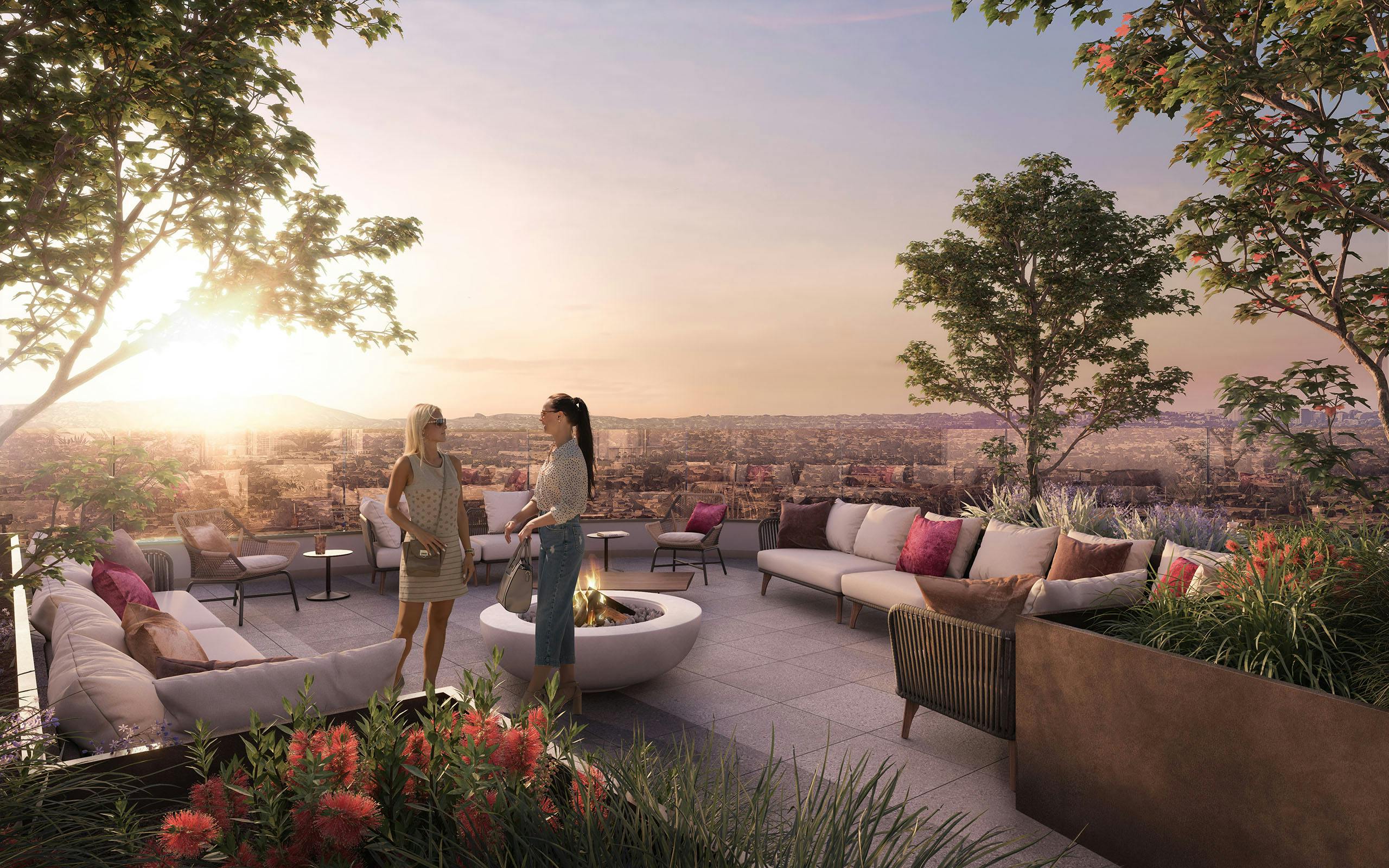 Rendering of landscaped sunset deck at AMLI Aero with 2 women talking near outdoor furniture and fire pit with panoramic views