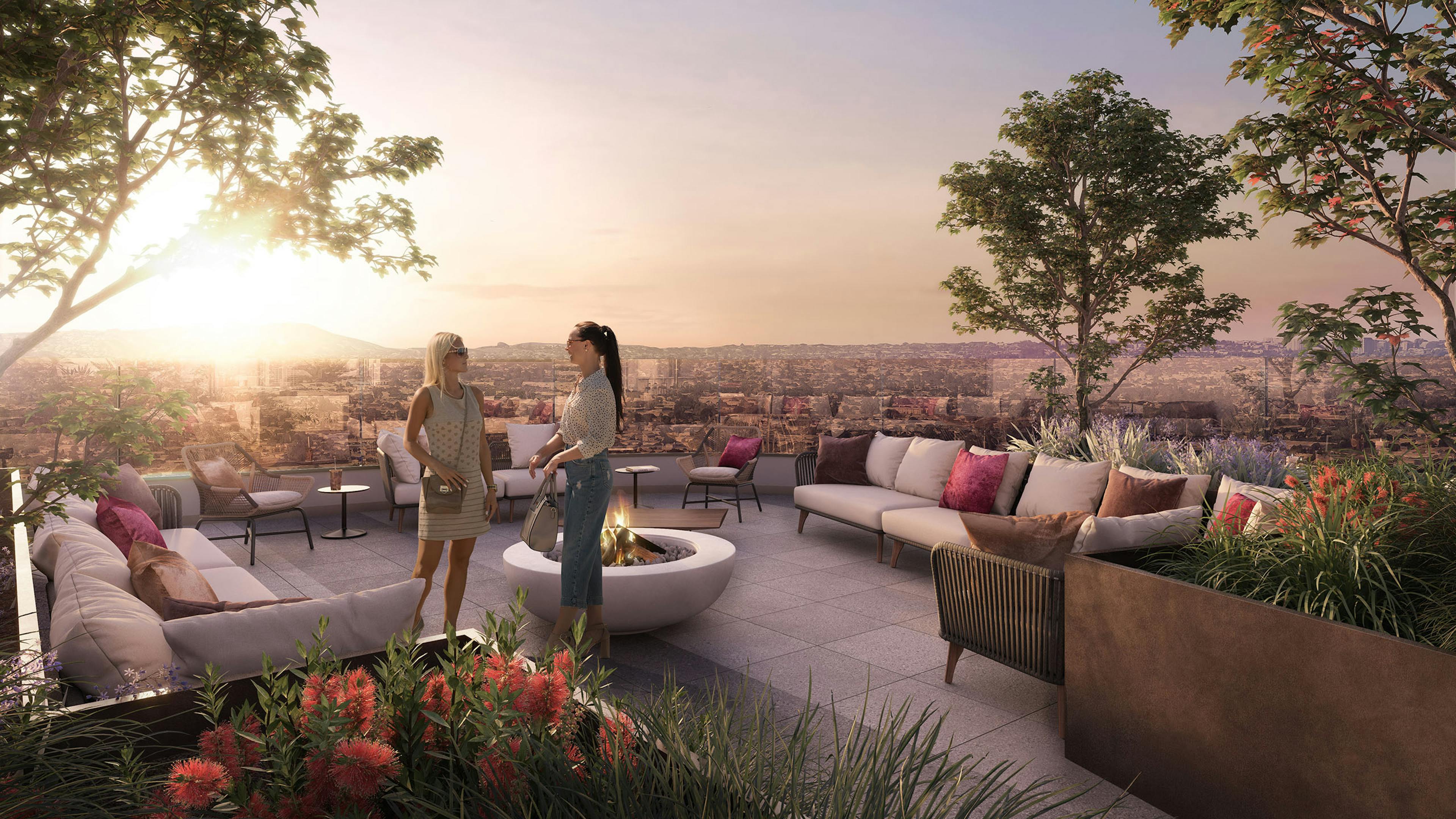 Rendering of landscaped sunset deck at AMLI Aero with 2 women talking near outdoor furniture and fire pit with panoramic views