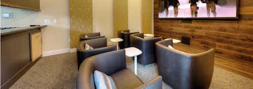 AMLI South Lake Union media room with floor to ceiling projector screen and theater like seating