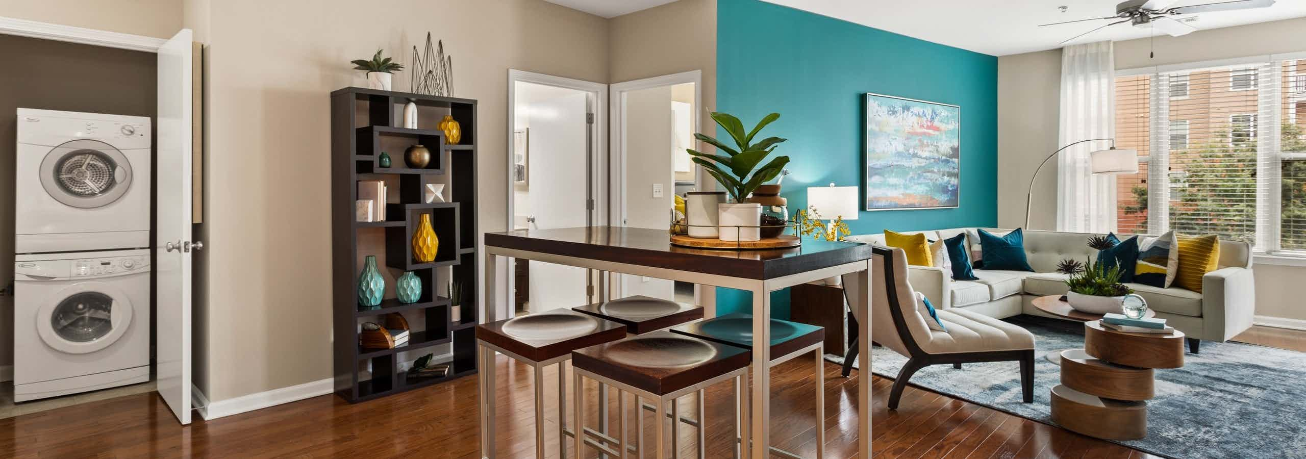 Dining area, washer/dryer and living room