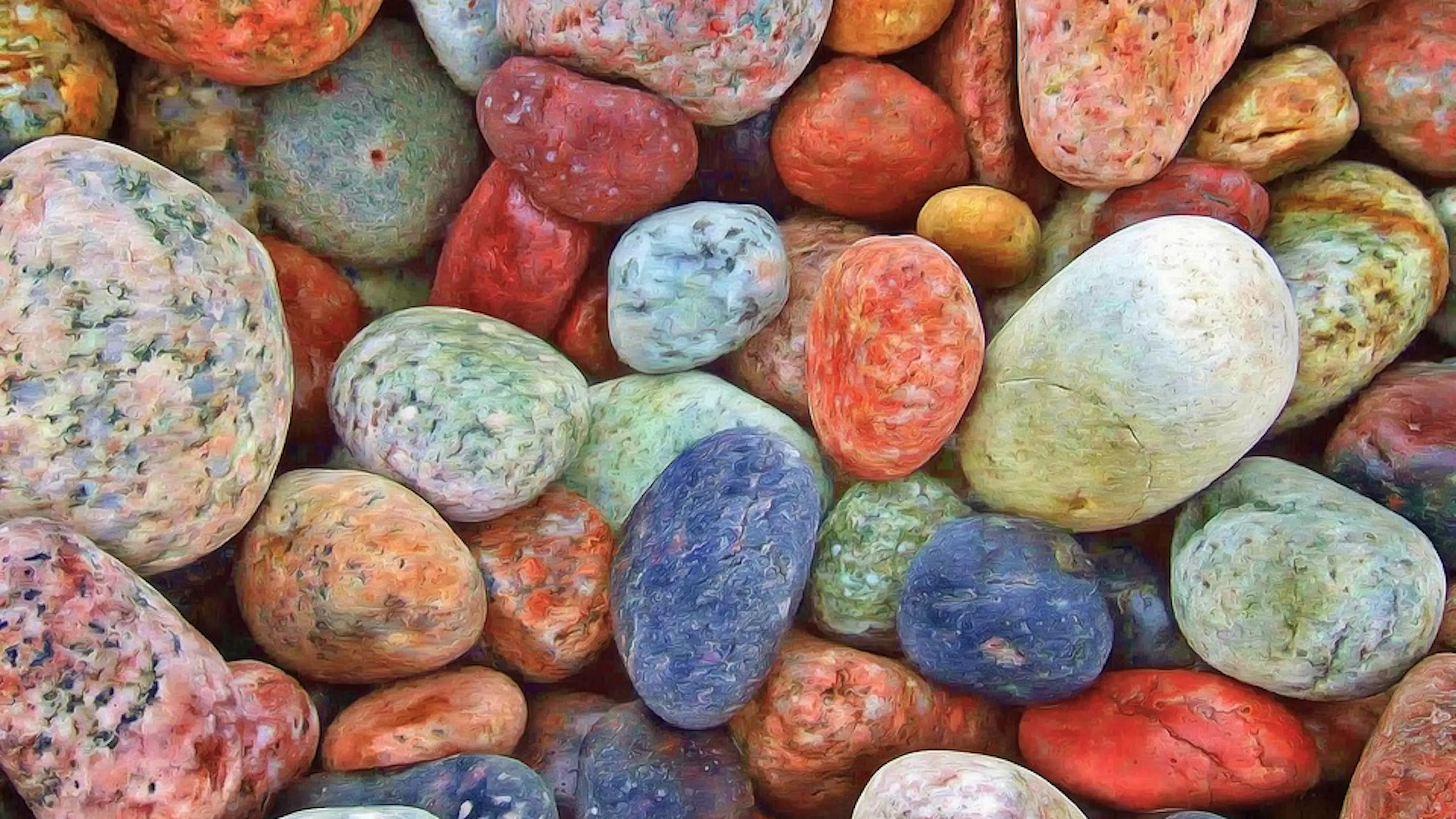 A close up of a collection of small pebbles and rocks of many different sizes and colors
