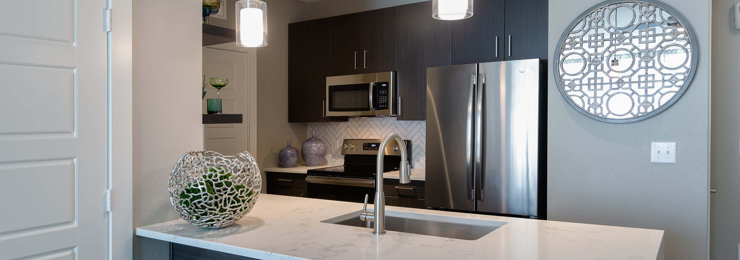 Kitchen with ceramic tile backsplashes