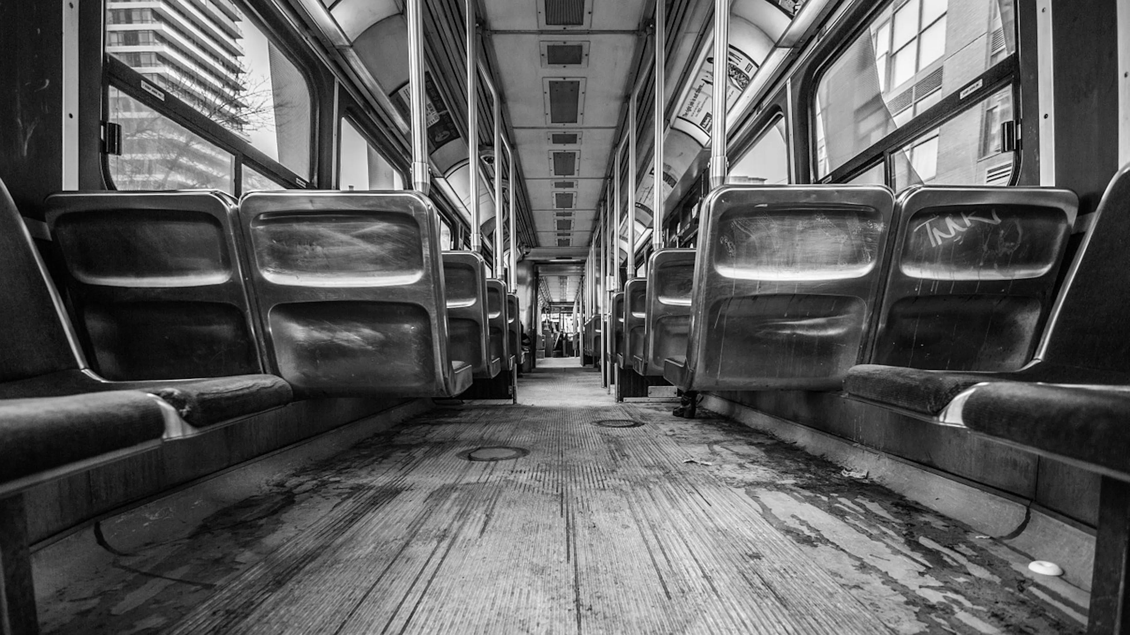 interior of old empty streetcar taken from seat-level