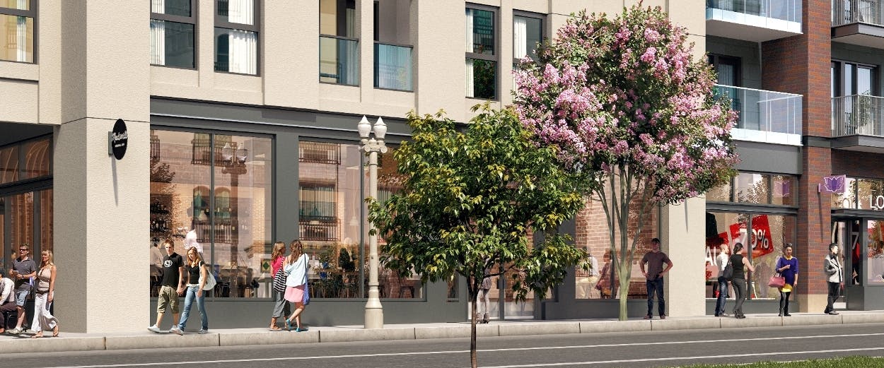 Rendering of retail windows along a sidewalk with trees at AMLI Old Pasadena