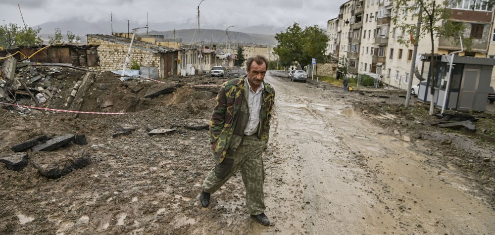 A man walks in the breakaway Nagorno-Karabakh region's main city of Stepanakert on October 6, 2020, during the ongoing fighting between Armenia and Azerbaijan over the disputed region. 
