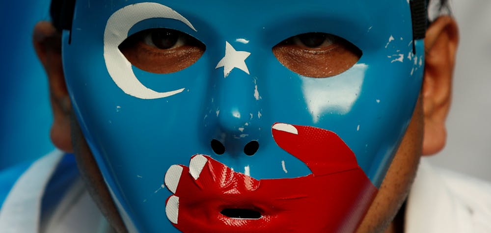 A Chinese Uyghur Muslim participates in an anti-China protest during the G20 leaders summit in Osaka, Japan June 28, 2019. REUTERS/Jorge Silva     TPX IMAGES OF THE DAY