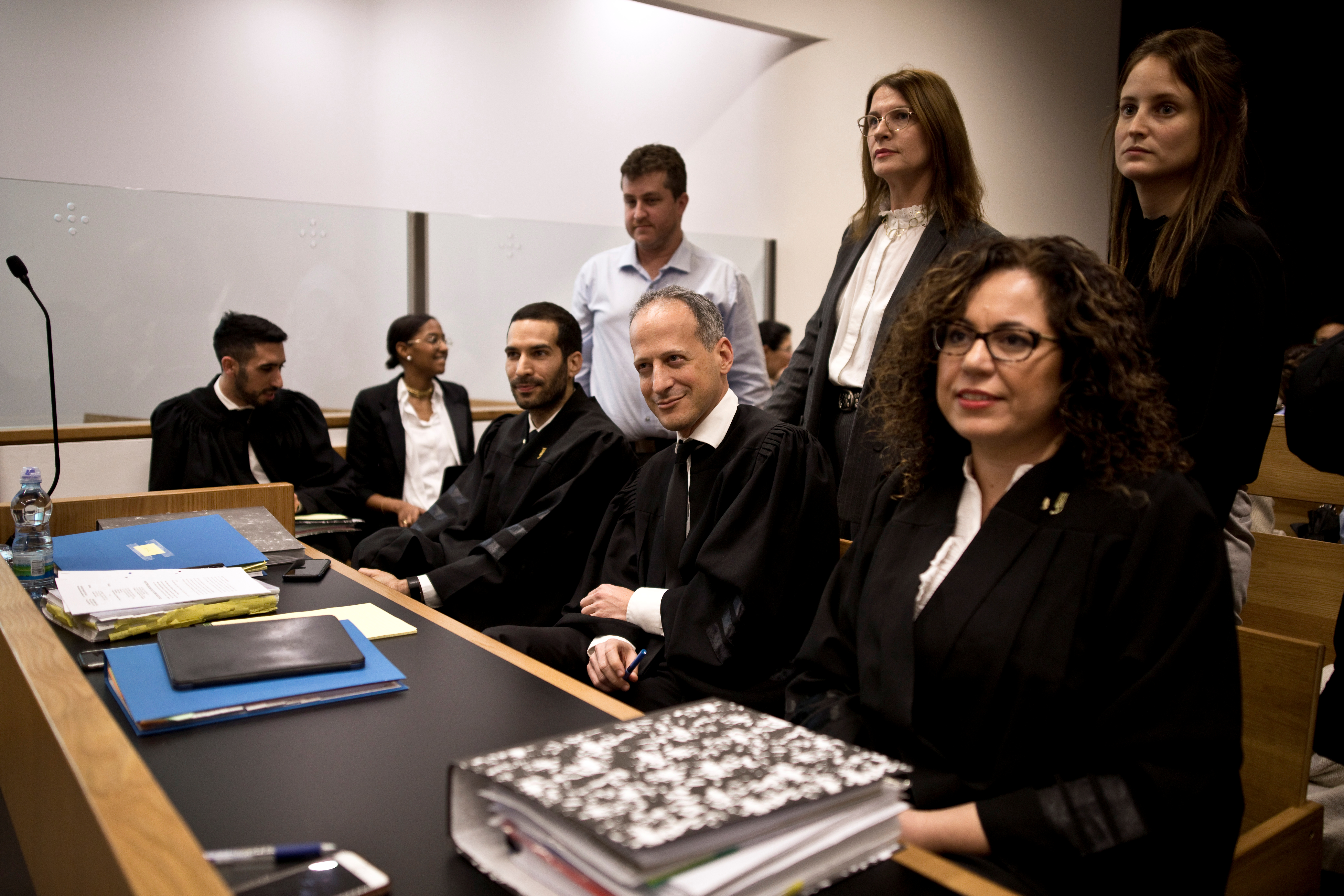 A legal team, including attorney Ran Sprinzak, attends a court hearing on Amnesty International's legal bid to have Israel revoke the export license of the Israeli NSO surveillance firm, at Tel Aviv's District Court, Israel January 16, 2020. REUTERS/Corinna Kern
