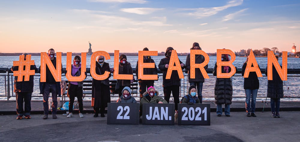Activists from New York-based direct action group Rise and Resist and the International Campaign to Abolish Nuclear Weapons (ICAN) took to the streets to announce the entry into force of the Treaty on the Prohibition of Nuclear Weapons on January 22, 2021 by holding illuminated letters that read #NUCLEARBAN in front of iconic New York landscapes. 