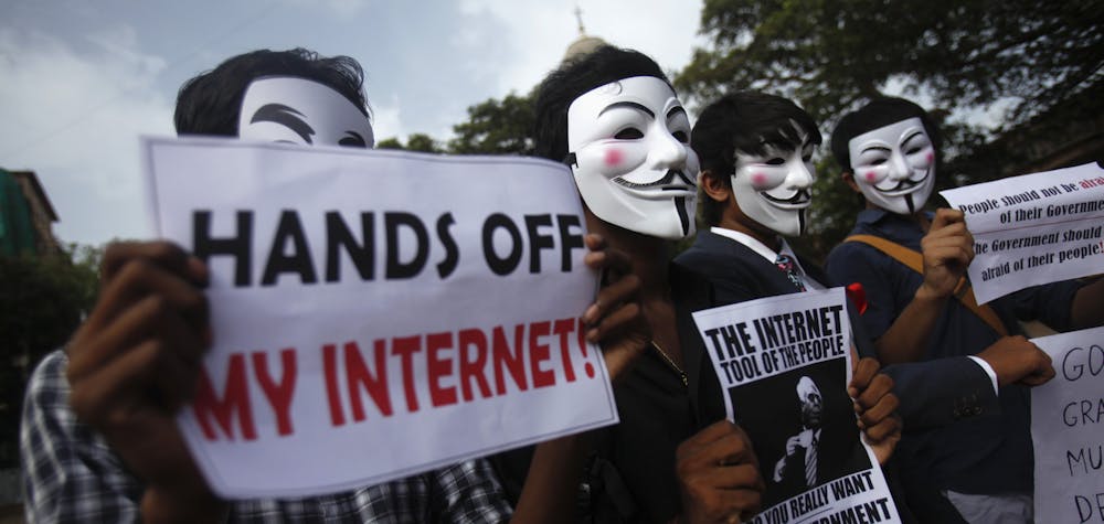 Protesters from the Anonymous India group of hackers wear Guy Fawkes masks as they protest against laws they say gives the government control over censorship of internet usage in Mumbai, June 9, 2012. Anonymous India is associated with the internationa hacker group Anonymous whose previous targets have included high profile targets. REUTERS/Vivek Prakash