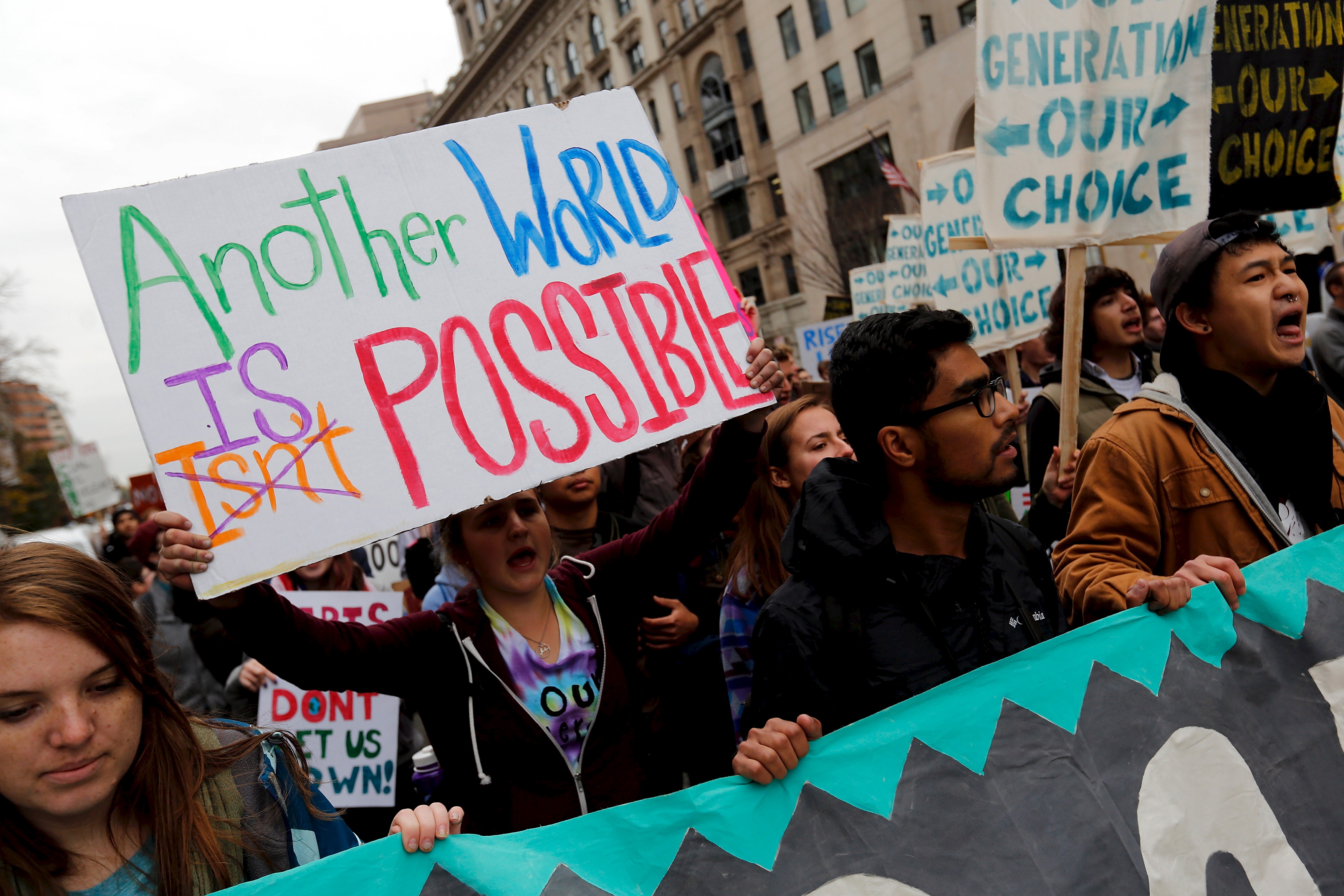Students participate in the 'Our Generation, Our Choice' protest in downtown Washington November 9, 2015. The Monday march to highlight race, climate, and immigration issues was timed to mark exactly one year until the 2016 U.S. presidential election.  REUTERS/Jonathan Ernst