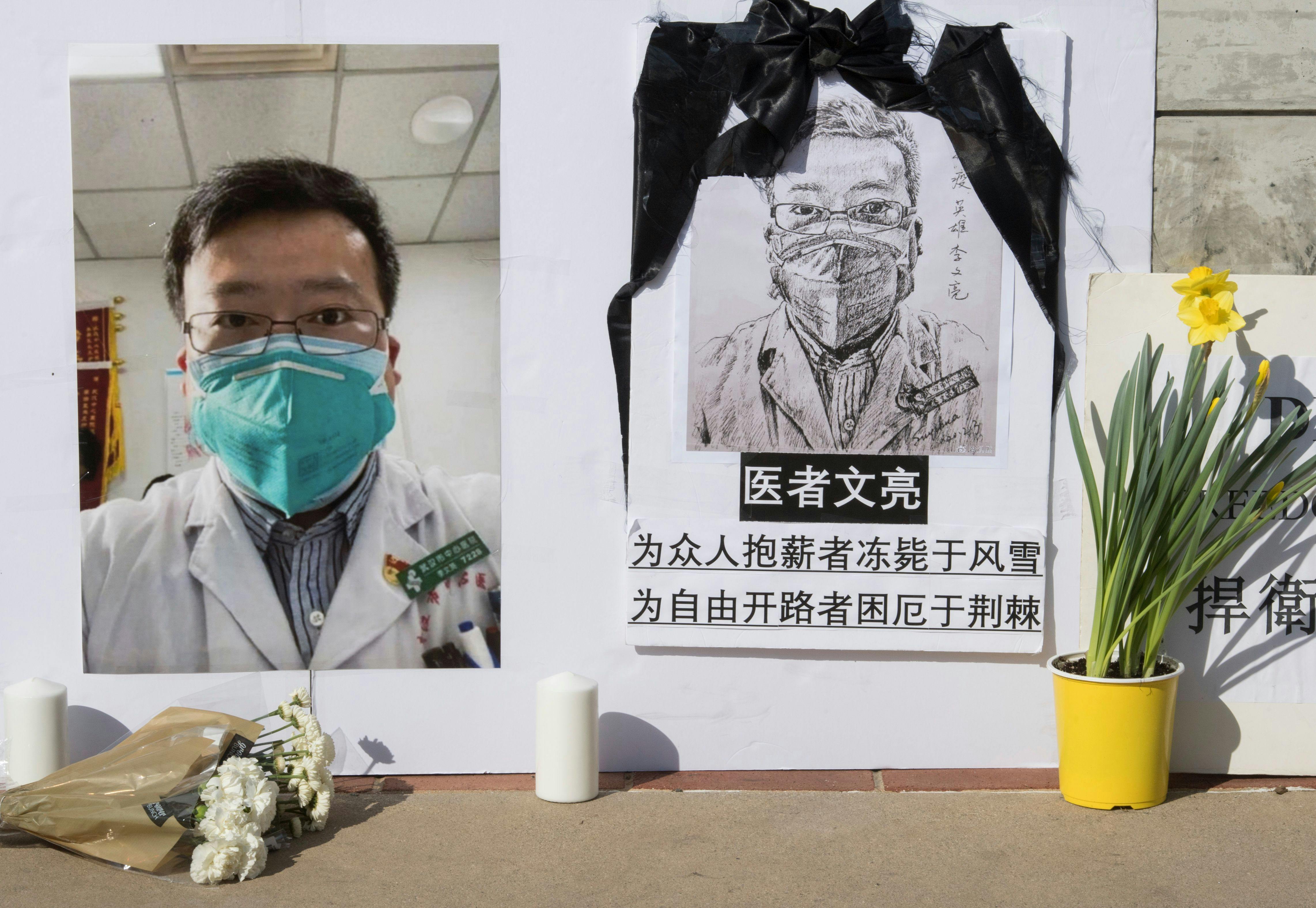 	TOPSHOT - A memorial for Dr Li Wenliang, who was the whistleblower of the Coronavirus, Covid-19, that originated in Wuhan, China and caused the doctors death in that city, is pictured outside the UCLA campus in Westwood, California, on February 15, 2020. - The death toll from the new coronavirus outbreak surpassed 1,600 in China on Sunday, with the first fatality reported outside Asia fuelling global concerns. (Photo by Mark RALSTON / AFP) (Photo by MARK RALSTON/AFP via Getty Images)