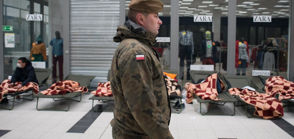 The Mlyny shopping center has been transformed by the polish army into a shelter for refugees as UNHCR announced that at least 350 000 refugees have already fled the country, following the Russian invasion of Ukraine. Korczowa, Poland on February 27, 2022. Photo by Nathan Laine/ABACAPRESS.COM