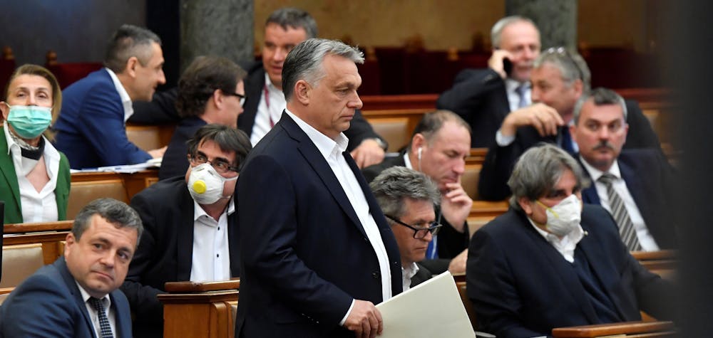 Hungarian Prime Minister Viktor Orban arrives to attend the plenary session of the Parliament ahead of a vote to grant the government special powers to combat the coronavirus disease (COVID-19) crisis in Budapest, Hungary, March 30, 2020. 