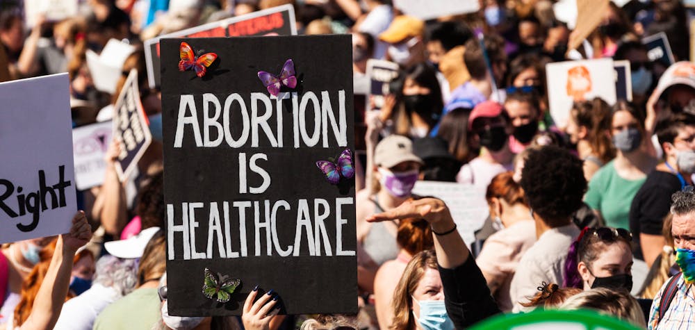 Signs at the Women's March Rally for Abortion Justice in Washington, DC.  Protesters demand the US government protect women's reproductive rights and access to abortion nationwide.  Specifically, they are calling on Congress to pass the Women's Health Protection Act (WHPA) and EACH Act, which guarantee abortion access and require it to be covered by insurance.  More than 600 satellite protests are happening nationwide on October 2.  The events are partly in response to restrictive anti-abortion laws recently passed in Texas and Mississippi, and the Supreme Court's refusal to strike down the Texas law. (Photo by Allison Bailey/NurPhoto) (Photo by Allison Bailey / NurPhoto / NurPhoto via AFP)