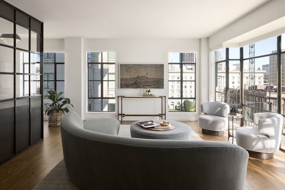 Andrew-Mann-Architecture-California-Nob-Hill-Pied-à-terre-Living-Room-Curved-Sofa-Backside