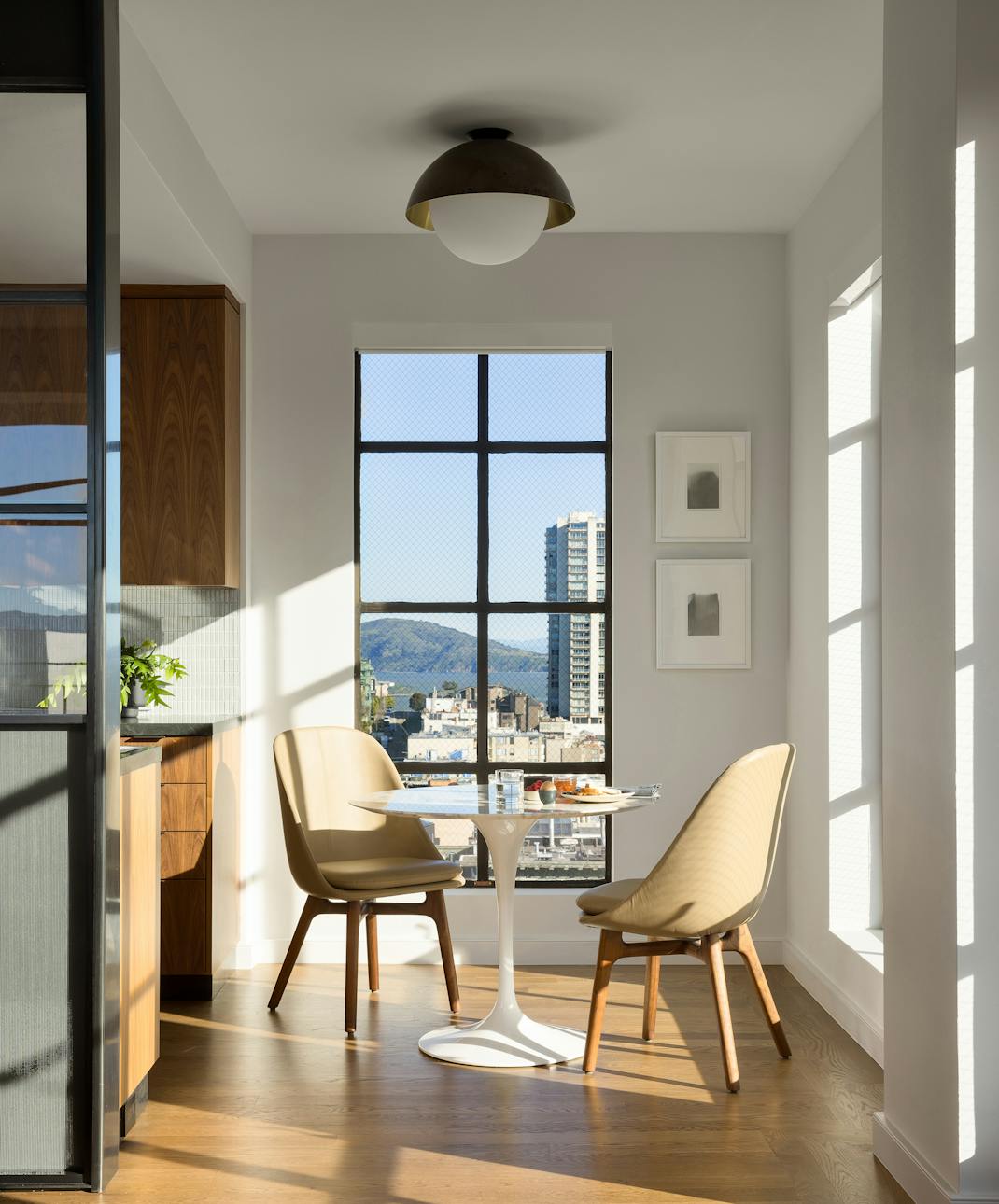 Andrew-Mann-Architecture-California-Nob-Hill-Pied-à-terre-Sunlight-Kitchen-Dining-Table-for-Two