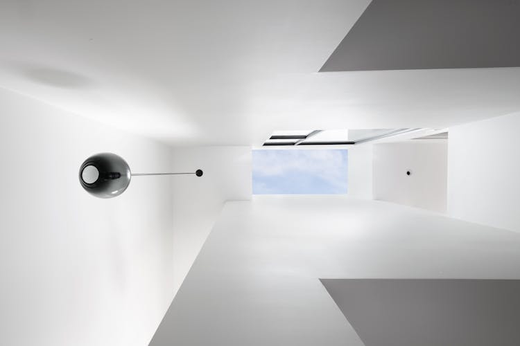 Andrew-Mann-Architecture-California-Historic-Cottage-Row-look-Up-Skylight-Full-View