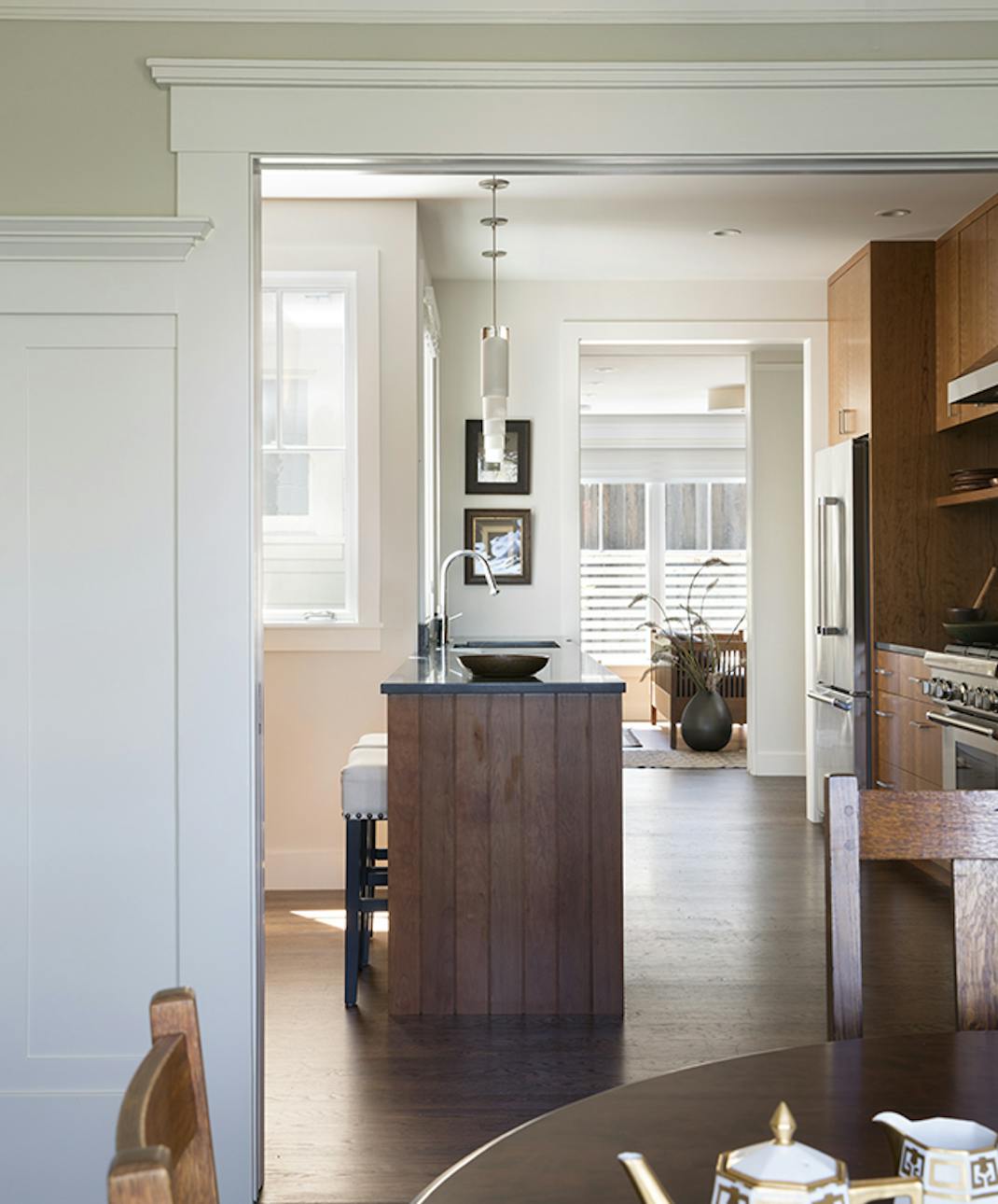 Andrew-Mann-Architecture-California-Modern-Craftsman-Kitchen-Island-from-Dining-Room