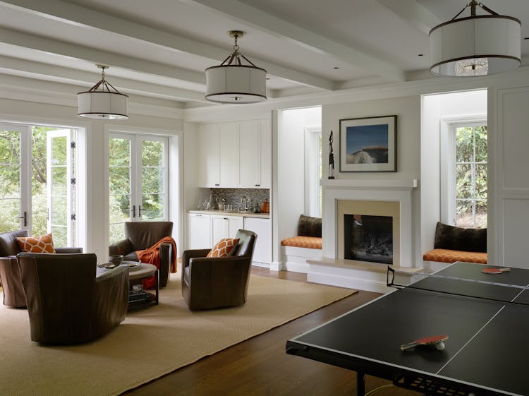 Andrew-Mann-Architecture-California-Spanish-Revival-Family-Room-Table-Tennis-Club-Chairs