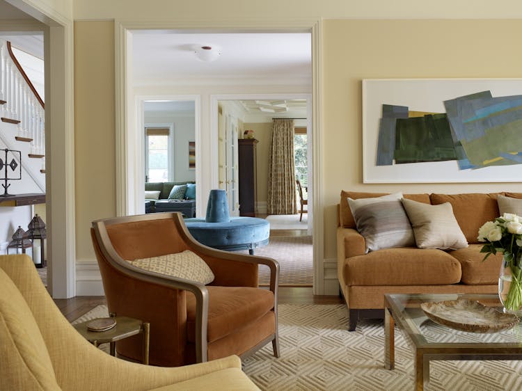 Andrew-Mann-Architecture-California-Spanish-Revival-Living-Room-Sofas-and-Artwork