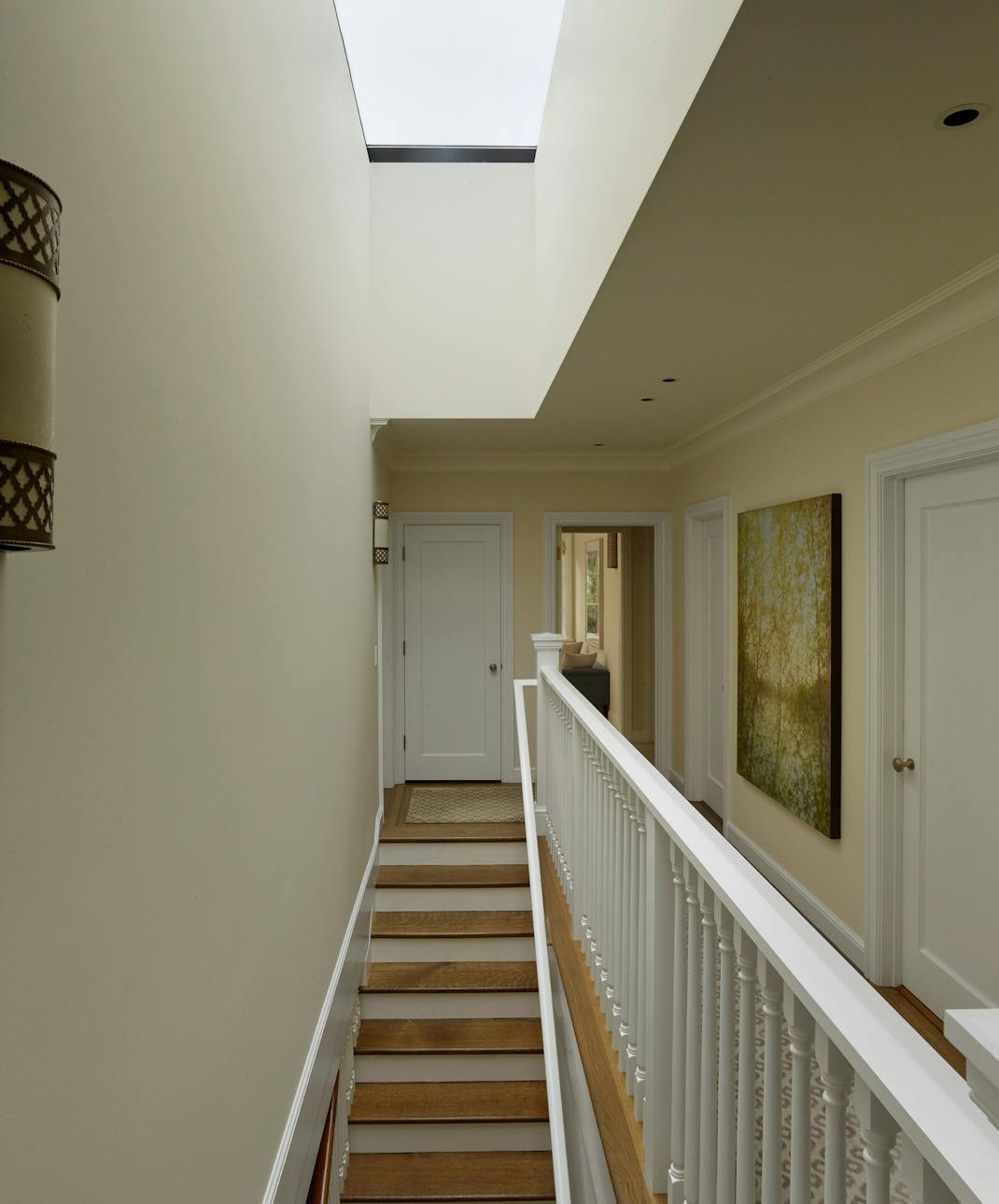 Andrew-Mann-Architecture-California-Spanish-Revival-Stairwell-with-Skylight