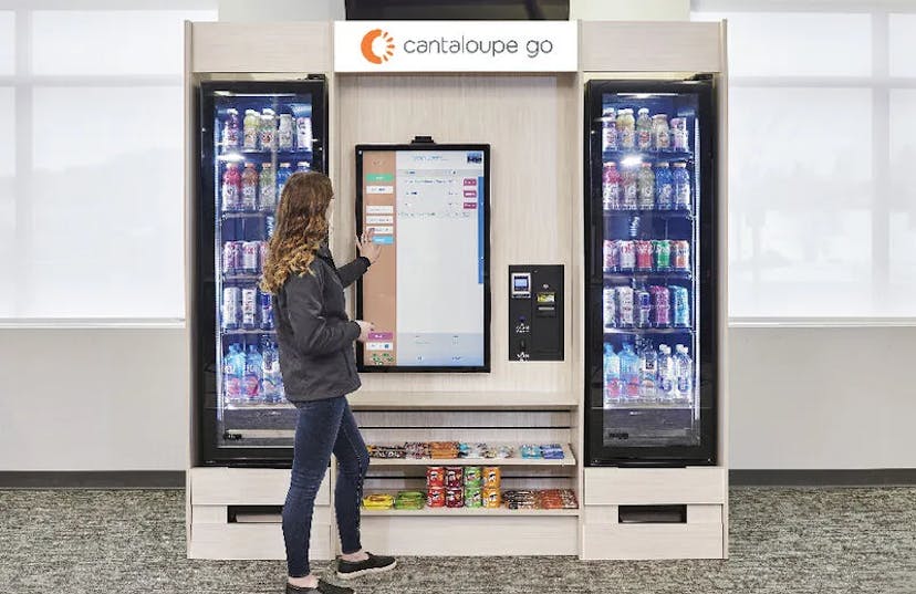 Woman using a micro market kiosk