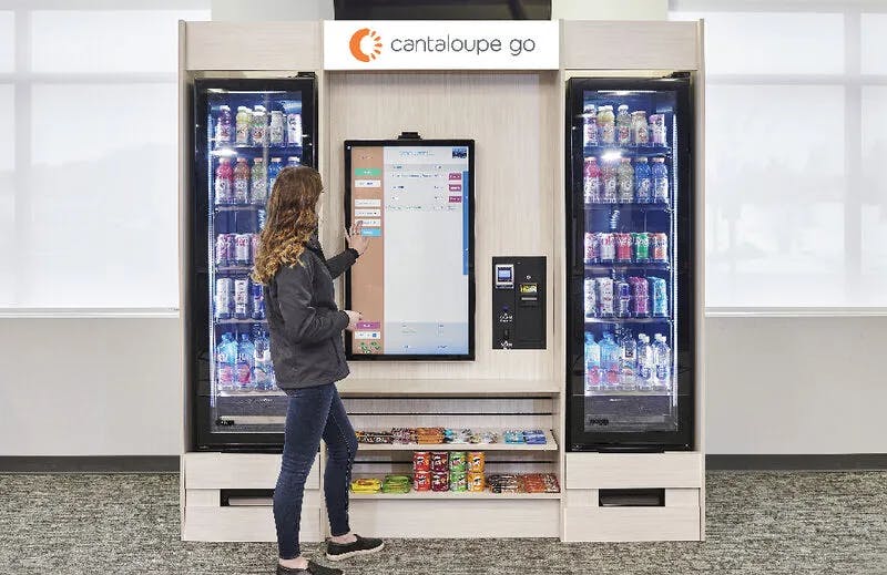 Woman using a micro market kiosk