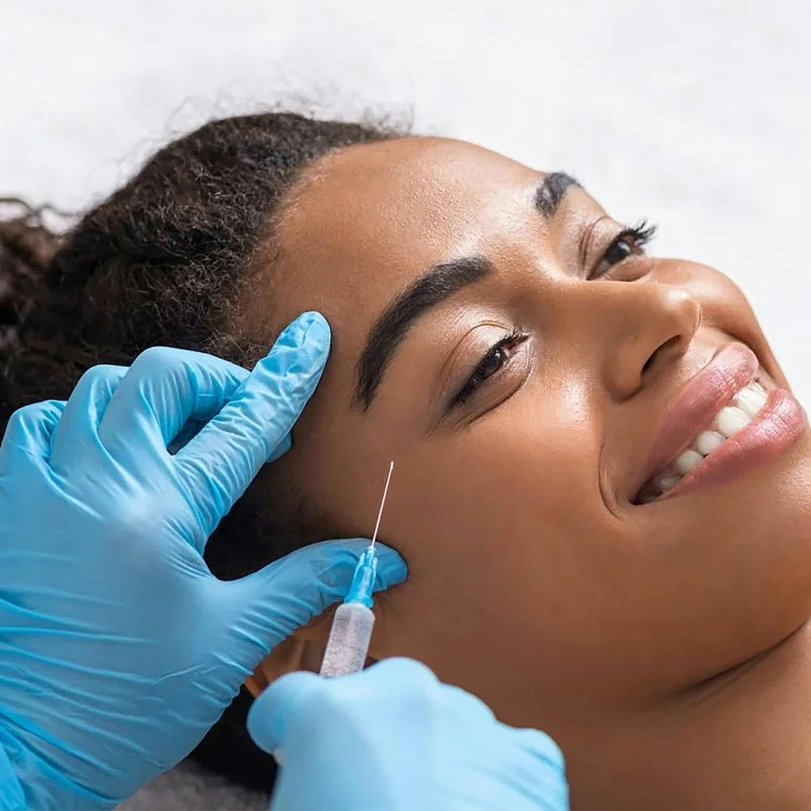 A female patient receiving anti-wrinkle injection treatment