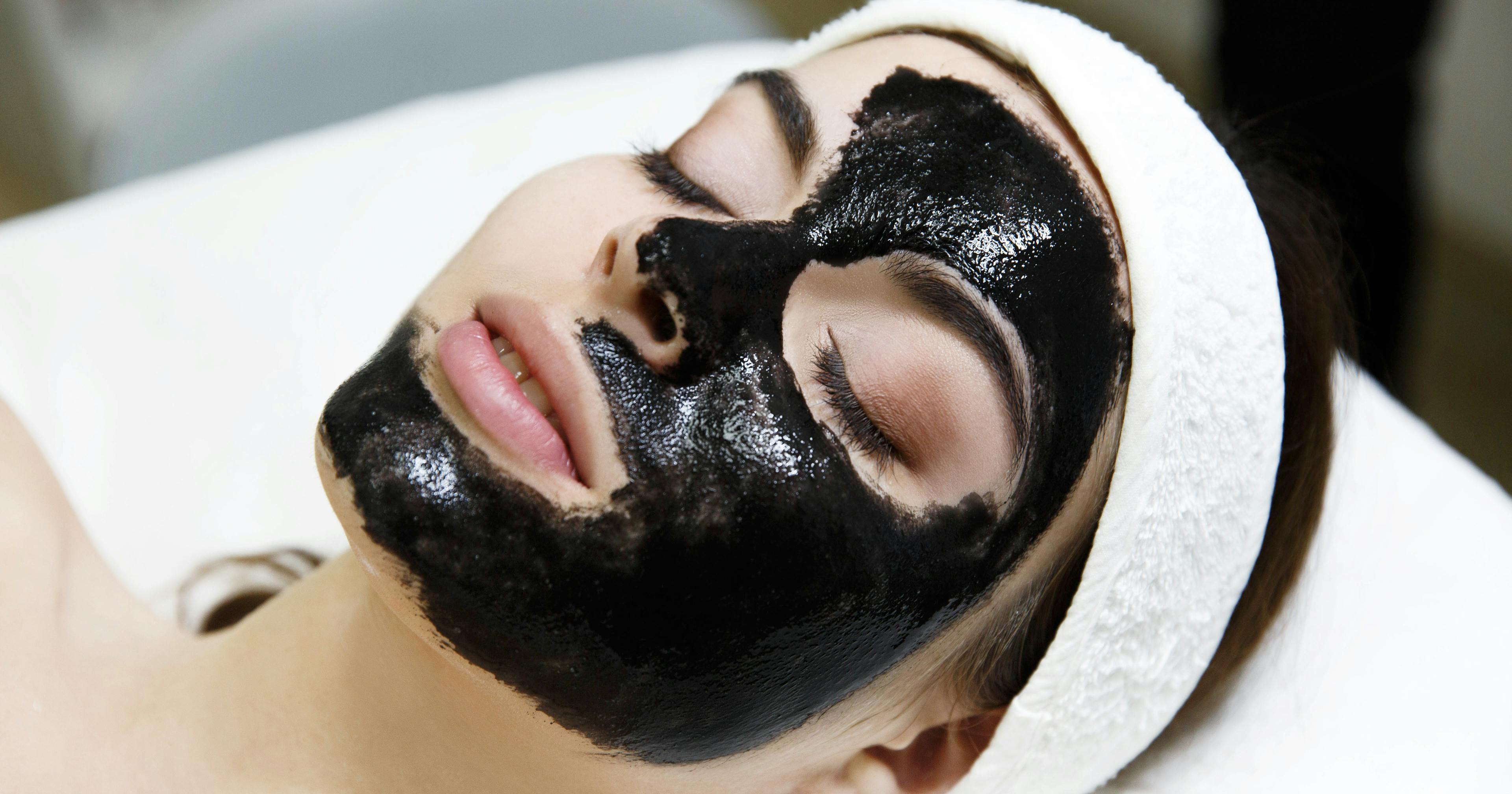 A female patient receiving deep detox facial treatment
