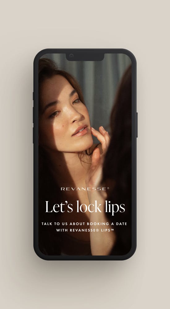 iPhone showing a Revanesse ad featuring a woman applying makeup