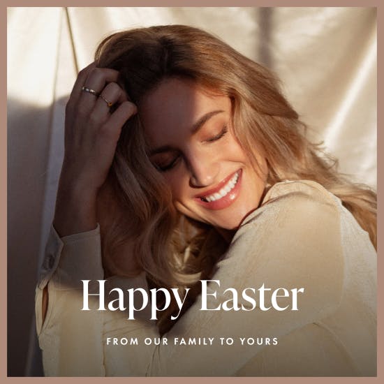 A woman smiles with the text Happy Easter written below