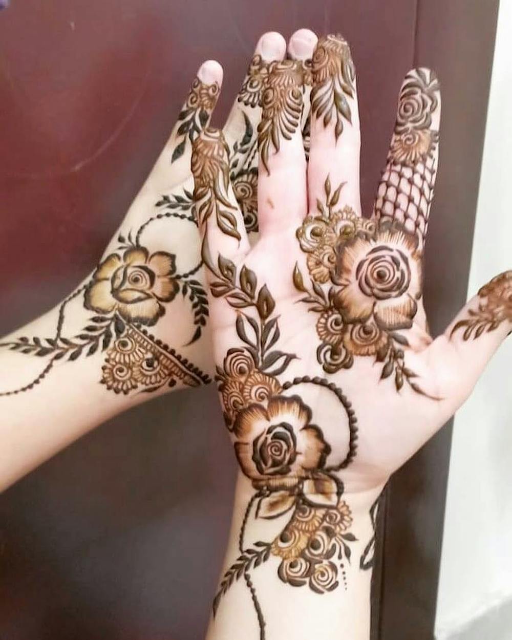 Rose mehndi design for brides
