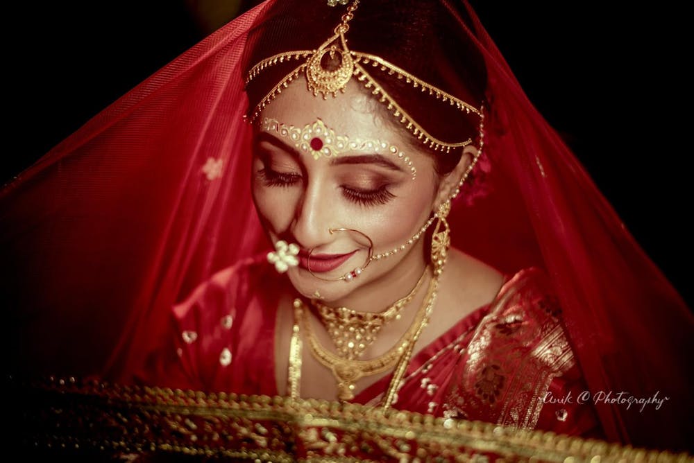 Red Bengali Bridal Makeup