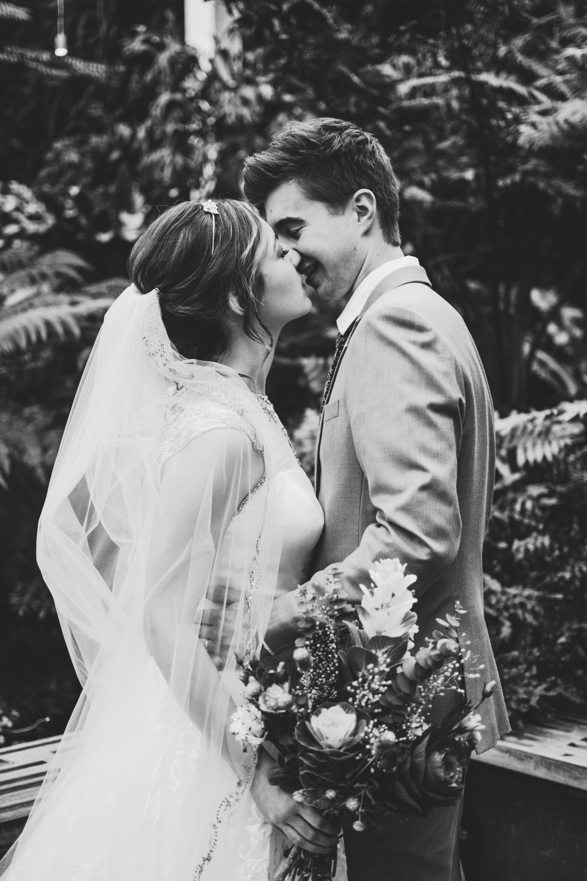 wedding couple kissing