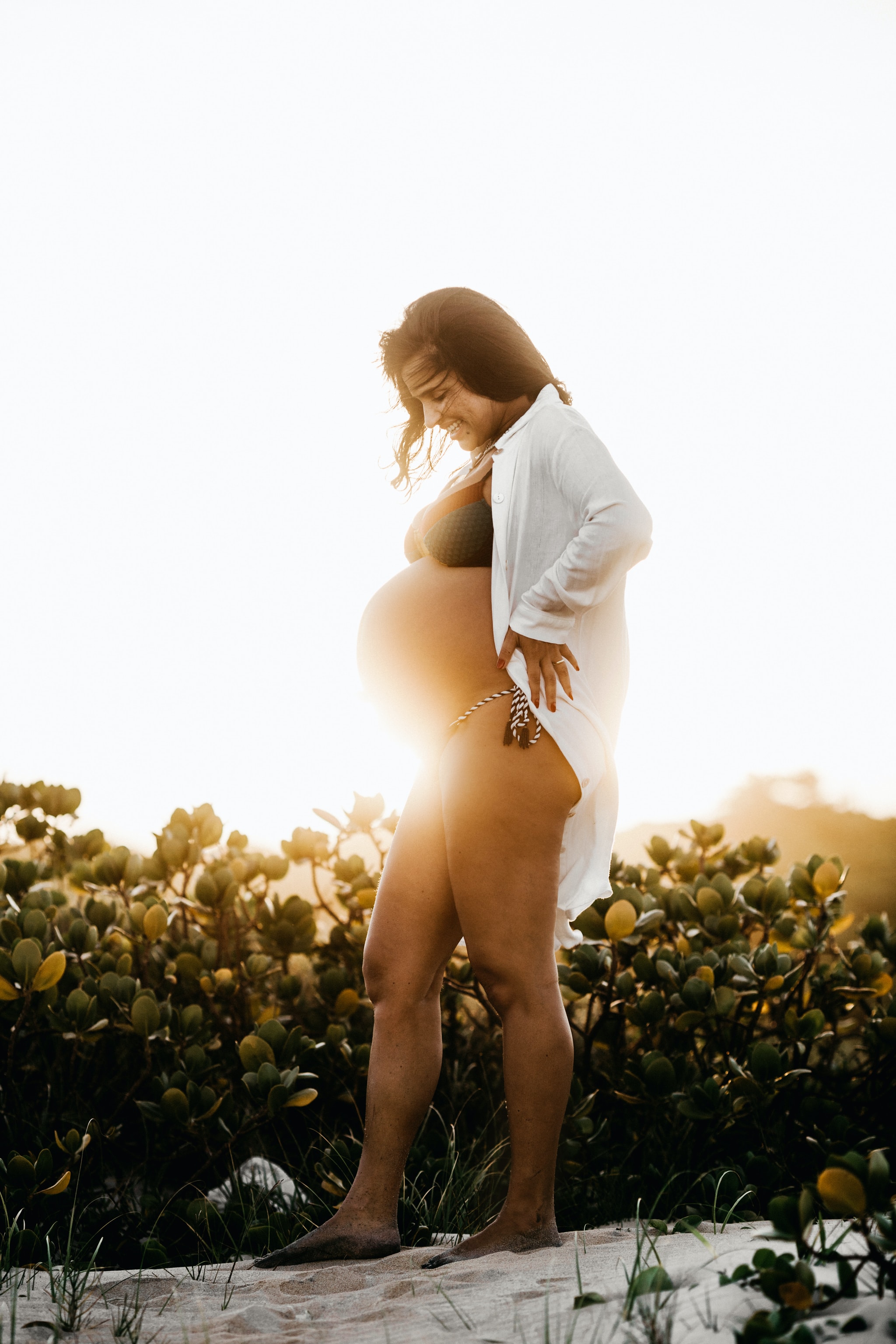 pregnant women sunset