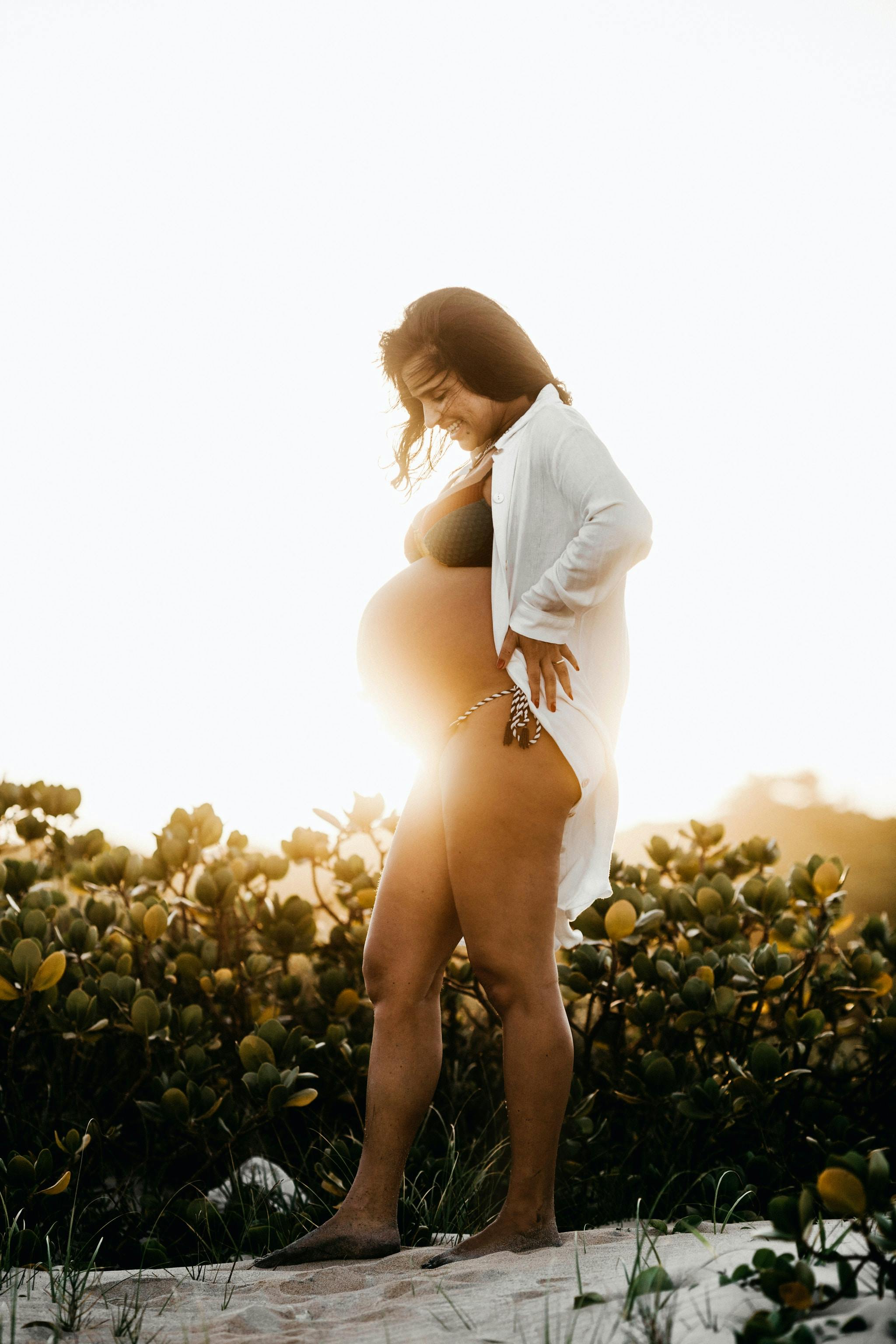 pregnant women sunset