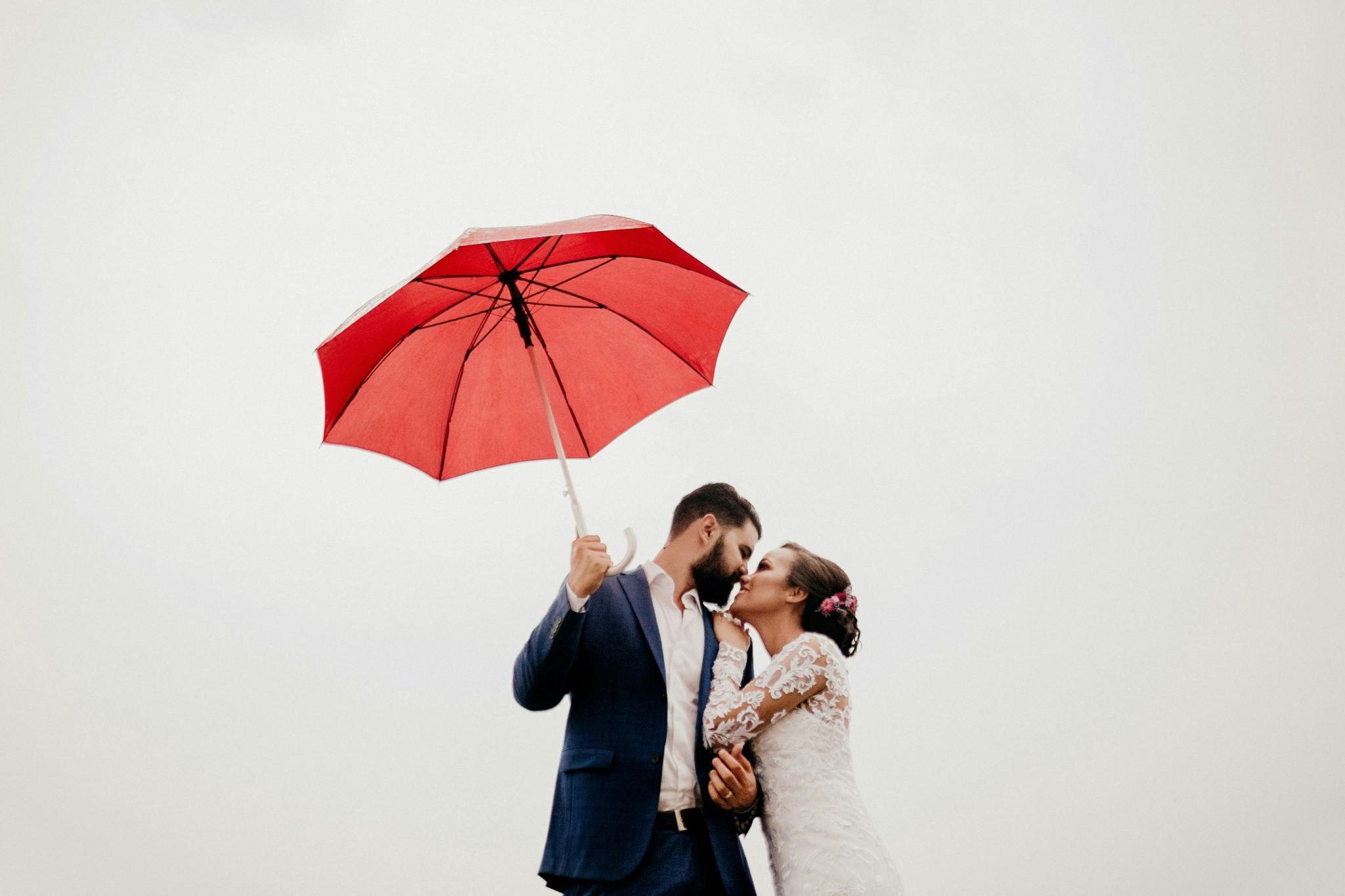 Couple with a red umbrella