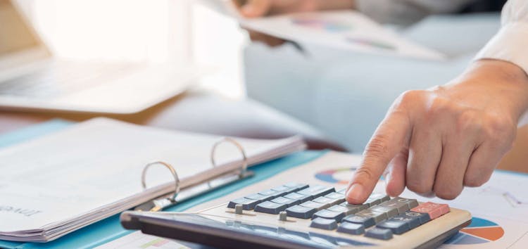 person using calculator