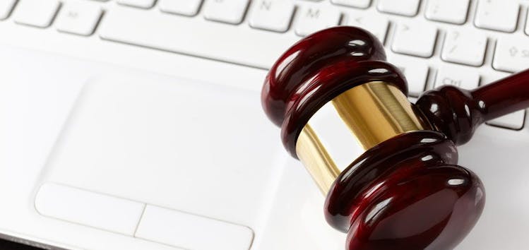 Gavel on laptop