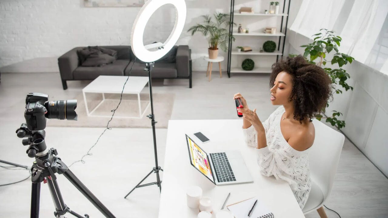 Influencer recording an unboxing video to boost eCommerce conversion