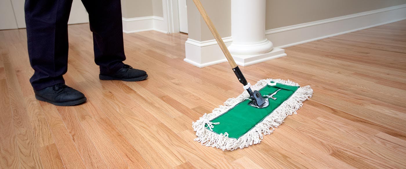 Cleaning a hardwood floor to prepare them to be refinished without sanding.