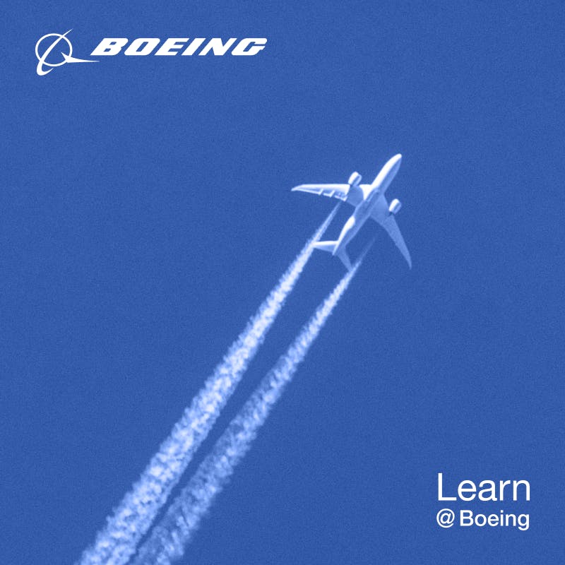 Learn@Boeing cover of brochure showing jet airplane in sky with clouds behind