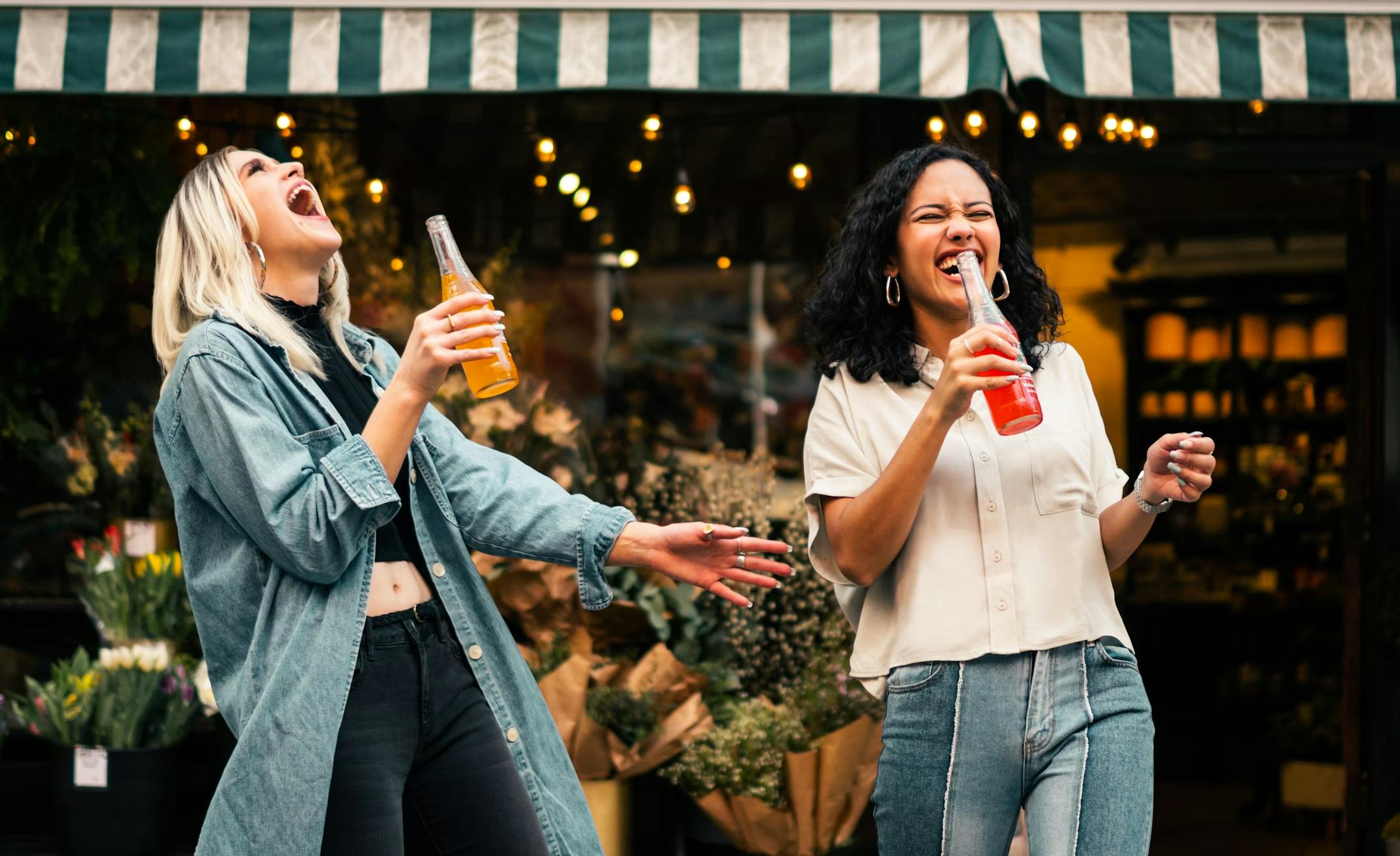 pair of girls enjoying thc seltzer