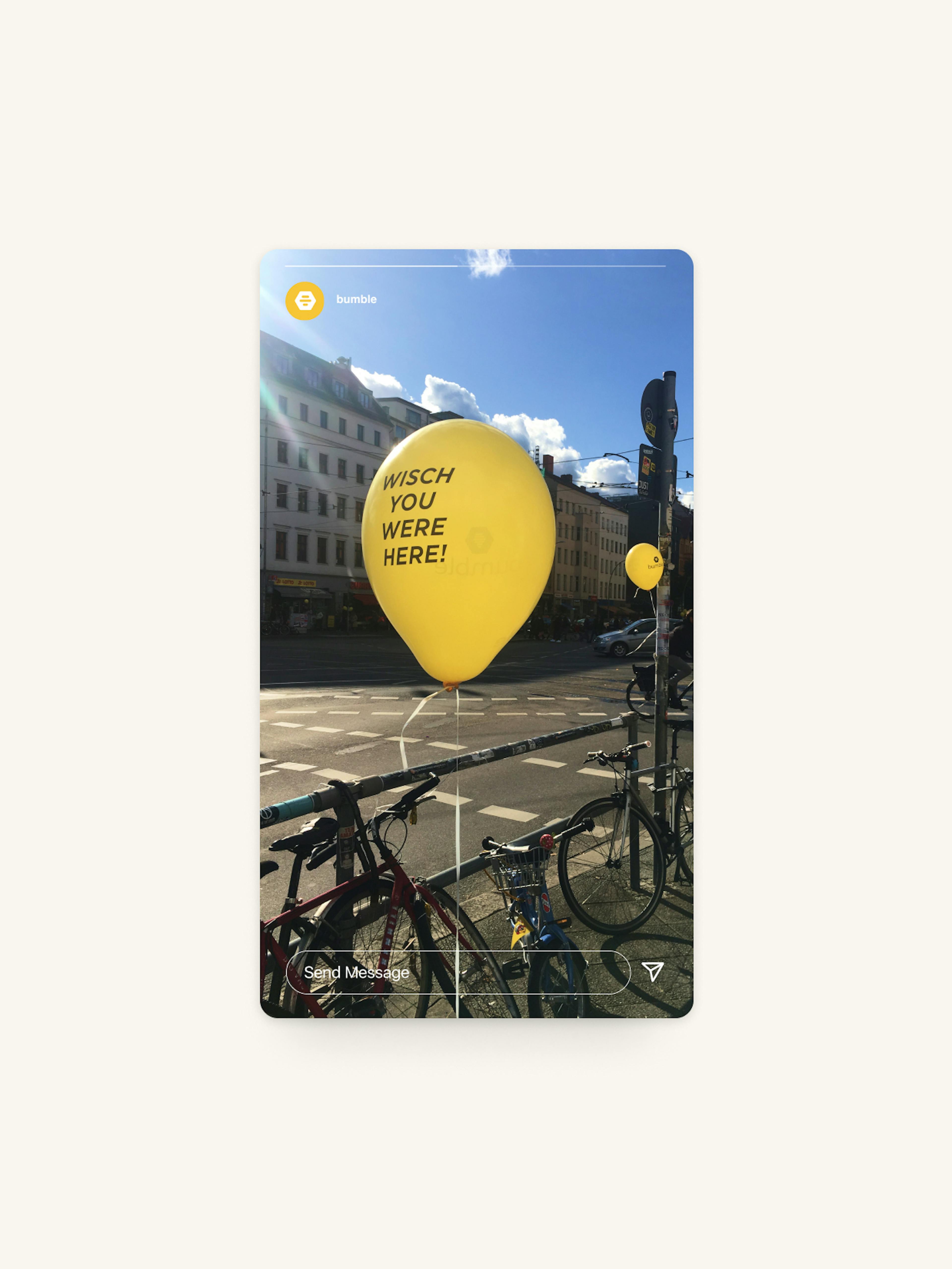 Bumble – Strategy & Brand Activation "Making the first move": Photo showing a yellow balloon with "WISCH YOU WERE HERE!" text floating on a Berlin street with parked bicycles x HY.AM Studios