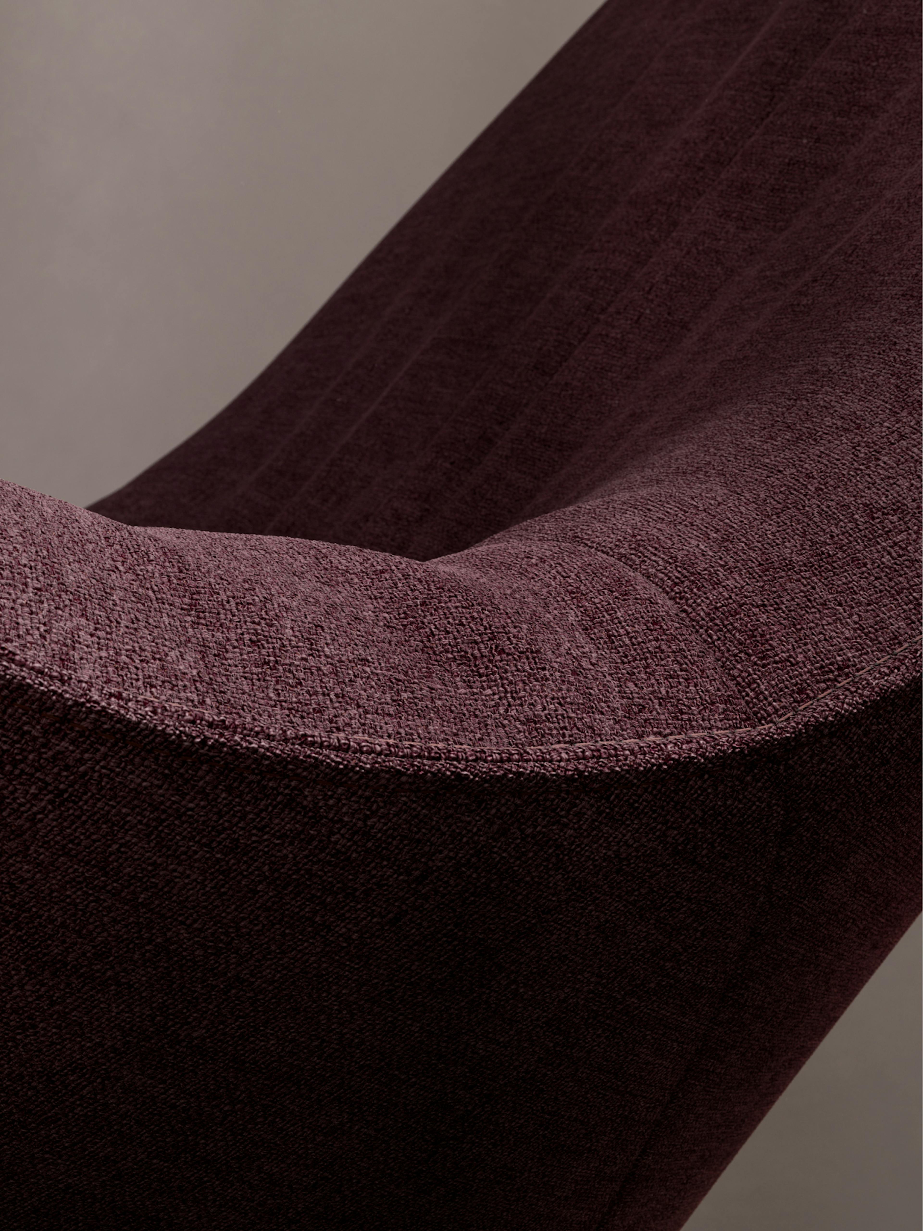 Walter Knoll – Brand Design, E-Commerce, Experience Design "The essence of excellence": Photo showing a close-up of dark red textured fabric with soft lighting x HY.AM Studios